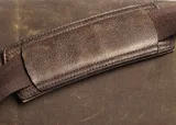 closeup of shoulder strap in tan