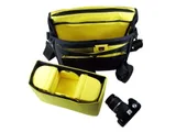 Accommodates DSLR with attached lens, an accessory flash, plus two or three additional lenses and accessories.