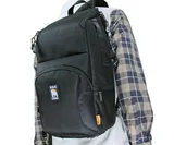 Built-in and retractable side mounted tripod caddy system.