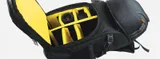 Multiple interior and exterior pockets hold accessories, pens, papers, and even extra clothing.     The front pocket is large enough for an iPad®.     Hefty mesh pockets on both sides with tie-down straps hold tripods, water bottles or other accessories.     The customizable interior features Ape Case’s Hi-Viz™ Yellow for seeing and finding dark equipment easily.