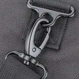 closeup of shoulder strap fixing at side of bag