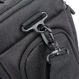 closeup of shoulder strap fixing at side of bag