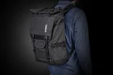 Thule Covert DSLR Rolltop Backpack worn on back