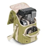 The padded main compartment holds and protects a mirrorless camera or small camcorder, with media accessories.