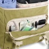 A large front pocket stores media accessories and personal items.