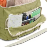 A large front pocket stores media accessories and personal items.