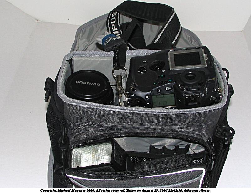 As I said, you can also switch the orientation so the 50-200mm lens is mounted, and either the EC-14 as well, or just separate in the pocket: