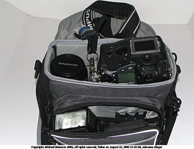 As I said, you can also switch the orientation so the 50-200mm lens is mounted, and either the EC-14 as well, or just separate in the pocket: