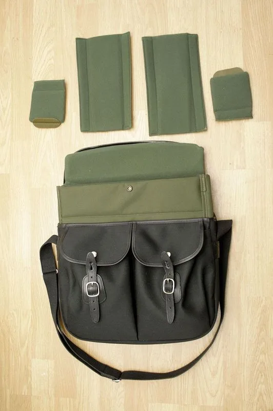 This is what it comes with - a soft, flexible and removable insert with 4 dividers.