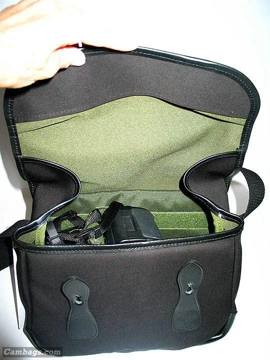 When the bag is opened, the flap has two "rain shiields" on each end that fold in automaticallly when the bag is closed.