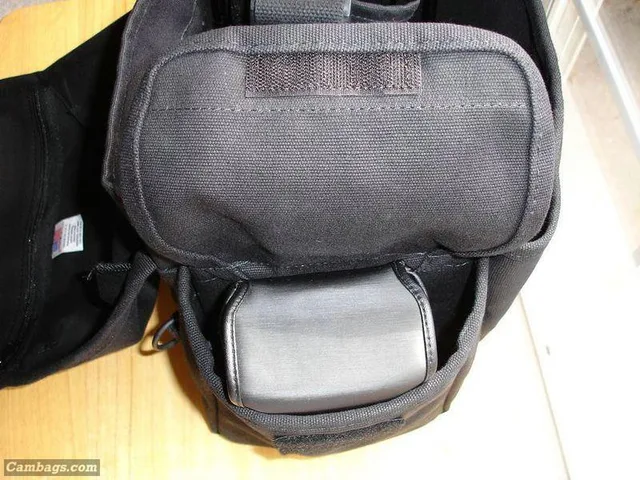 End pocket is big enough to hold Canon flash