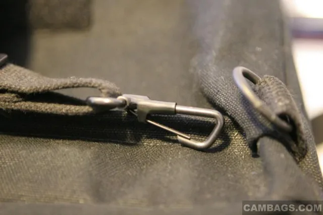 This is the standard Domke latch 9from another bag). It is not difficult to use, at all. Just for my "walk around" bag, I found the thumb latch easier.