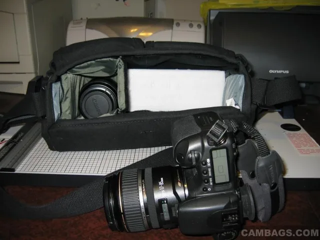 To protect the bottom lenses, I use the foam separator, which I took out of the sleeve (I just use the sleeve padding on the sides, take out front & back to reduce bulk...the canvas provides sufficient padding)