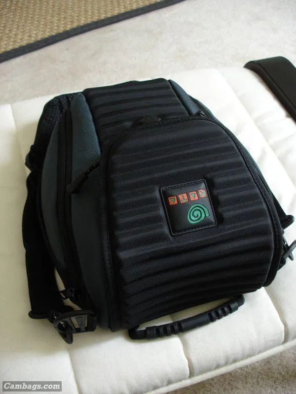 The outside of the H-14 is extremely well made. The 'ribbed cage' center section protects your investment without compromise. The zippers are heavy duty, the strap is extremely comfy and features the same grade nylon as car seatbelts.