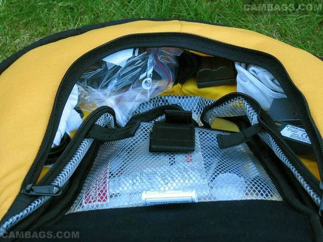 shot of the lid pocket with Rocket Blower, batteries, caps etc.