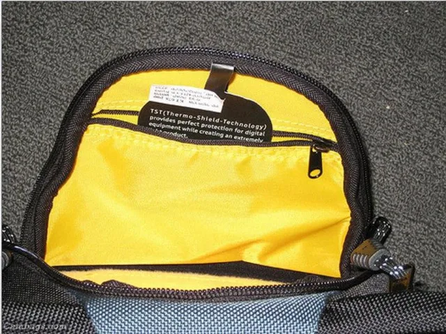 Zippered pocket in the front is useful but the rest of the opening is useless because it's too small for the Canon 400D.