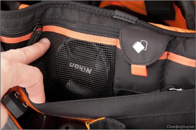 A mesh pocket for lens caps,batteries,etc