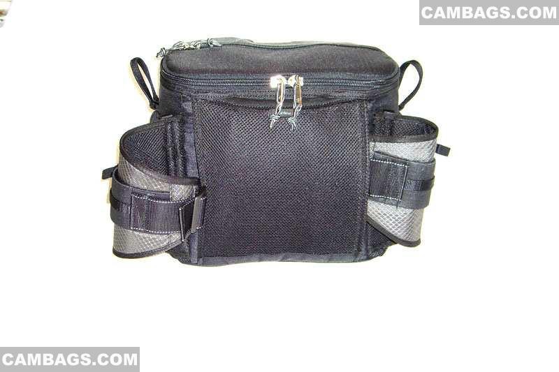 When carrying the  Speed Racer as a shoulder bag, you can tuck the waist belt into the back of the bag. It is actually very easy to do.