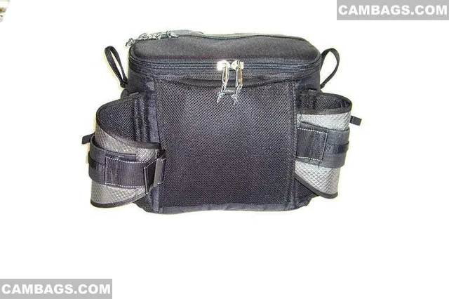 When carrying the  Speed Racer as a shoulder bag, you can tuck the waist belt into the back of the bag. It is actually very easy to do.