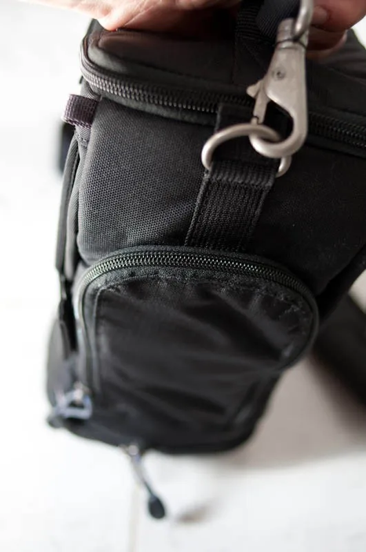on the side there is a small pocket for the all weather cover(not shown) and accessories like spare batteries.