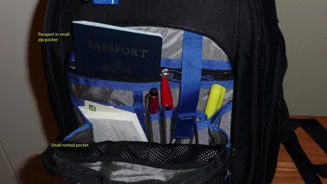 outside upper flap. It has a small netted pocket and a zippered pocket (which the Passport is in). There are a couple of pen pockets and business card pockets as well. The length of the upper pocket stops at the bottom where the outside lower pocket begi