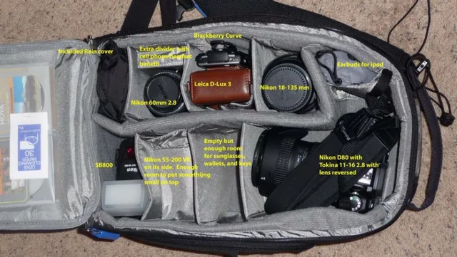 I took two extra dividers from another bag and used them where the 55-200 lens and 60mm lens are at. This gave me a little extra divider areas for other items. The 55-200 will fit sitting straight up but since I don't use it much, I laid it down and put o
