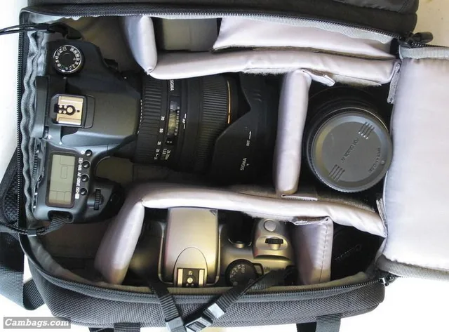 Upon opening up the main camera compartment, I found I could fit my Canon 40D with Sigma 24-70 f2.8 lens attached, along with a Sigma 70-300 lens, a Canon 50mm f1.8 prime, my spare Digital Rebel BODY, and my 420 EX flash with an Omni-bounce attachmen