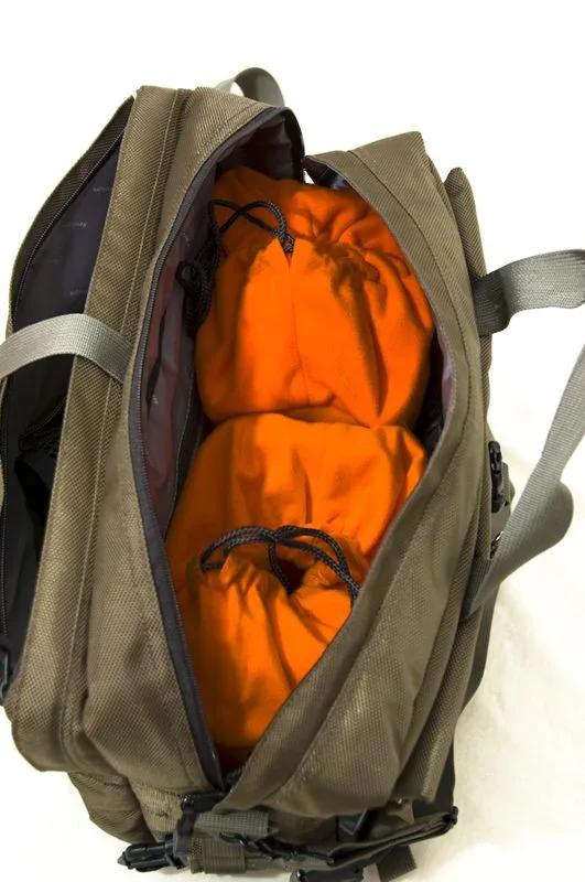 Inside the camera gear is well protected by two inserts that come with 3 dividers each , all made from soft material with Velcro strips .The inserts can be sealed with draw strings at the top.