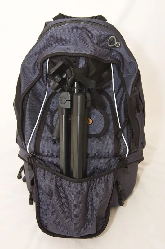 Opening it right out reveals a elasticated pocket in which you can place the tripod feet. The top is then secured by a strap and buckle. The image below shows a Manfrotto 718SHB tripod