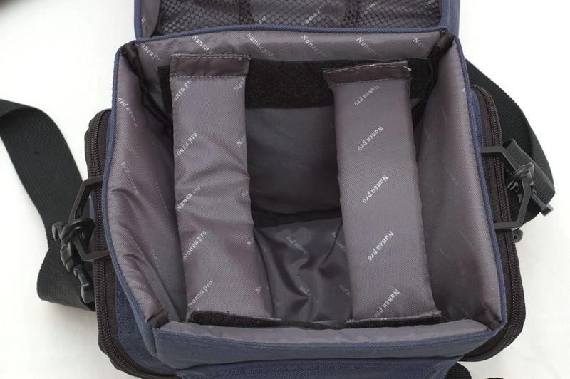 Heres the bag empty , it comes with a couple of velcro attached supports for the camera. Inside the lid is a net pocket , although it looks large it feels very tight and so you can only really squeeze in something thin like a filter box or two.