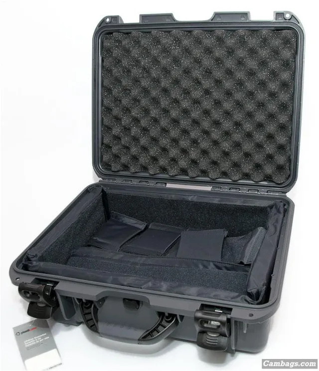Inside the case it comes with an array of dividers. Plus a removable base insert with velcro sides. There is also foam protection on the lid interior. I personally would prefer some pockets in the lid for manuals, reflectors,etc but the foam is good for extra protection. The dividers round the sides are twice as thick as the internal dividers offering plenty of cushioning.