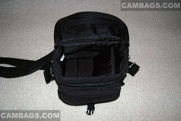 Put the included seperator down (velcro it in), and place either (50mm or 18-70mm) lens on top...