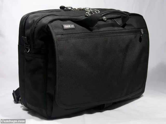 The UD60 is about the same size as my Briggs & Riley 17" laptop brief. Here's the front. There are several front compartments, a main camera compartment, and a dedicated laptop compartment.
