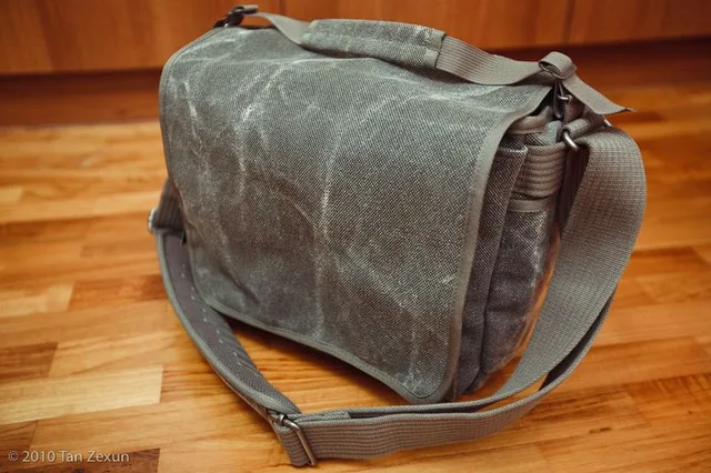 It's got great materials and comes with a weathered look. At first glance, my mom said it looked like an old army bag, so this bag definitely passes as being non-camera like. The stitching is perfect as well.