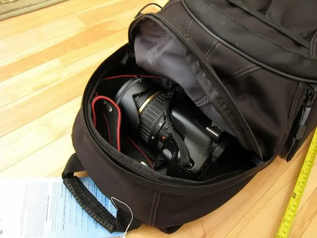 Big enough to store another XSI with a manual, small umbrella, small light, key, passport, whatever you want. A lot of room for non camera storage but it is not huge as advertised (it is more like a scam).  It also has 2 elastic holder (or you can call it 2 pockets) for you to store the filter boxes, lens cap, manual, map, AA battery etc. I am really satisfied.