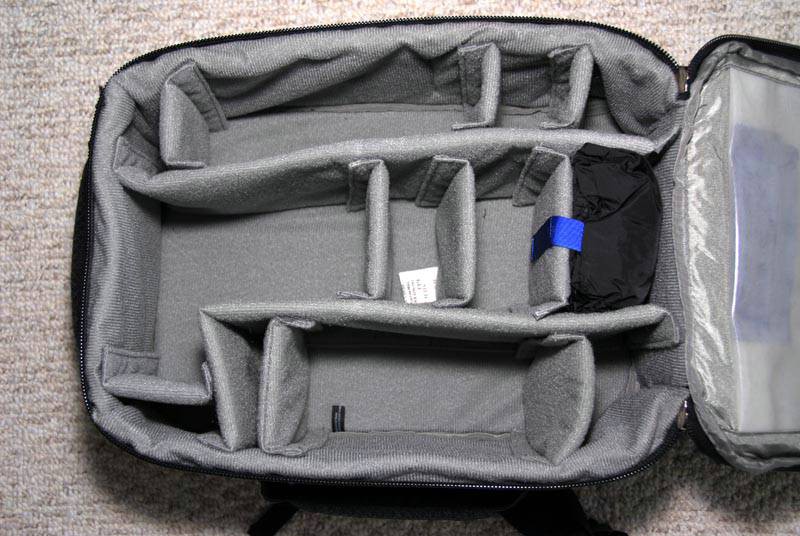 The inside is roomy and can be configured in any imaginable possibility. I took several dividers out.