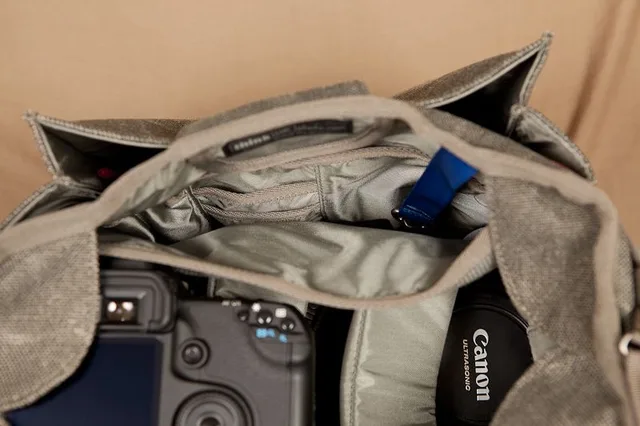 You’ll notice two inner side pockets in addition to the ones on the outside of the bag, which are used for storing flashes. I had no problems fitting my 580EX II in these either.  The bag has two more pockets on the inside (front and rear) to store things like pens, batteries, lens caps, filters, lens cloths, cable releases, wallet, cell phone, keys, etc… The one on the front has smaller compartments inside: